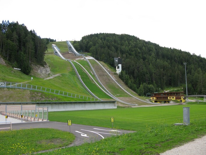 Toni Seelos Olympiaschanze ski jumping hills in Seefeld, Austria. The latest modernisation of the hills was done in 2010, when the biggest hill was enlarged from K90 (HS100) to K99 (HS109) and the smaller K68 (HS75) hill was built. Original description: The Ski Jumping Complex in Seefeld. Seefeld, Tirol, Austria, 2011.