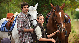 Personen mit Pferden