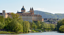 North side of Melk Abbey and entry of Melk river into the Danube. View from Emmersdorf, Lower Austria.