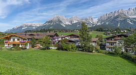 View of the Austrian municipality Going am Wilden Kaiser. The municipality is mainly known for its tourist attractions and its special environment (Wilder Kaiser). Here you can see the view of Going from the Lanzenweg.