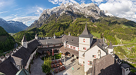 Courtyard and surroundings of castle Hohenwerfen, Werfen, near Salzburg, Austria. The medieval rock castle, situated on a 623 metres (2,044 ft) precipice overlooking the town of Werfen in the Salzach valley. The fortress is a "sister" of Hohensalzburg Fortress, both built by the Archbishops of Salzburg in the 11th century.